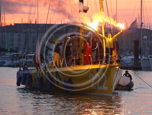 British yachtswoman Dee Caffari, 36, arrives in Les Sables d'Olonne, France onboard Aviva as she sets a new world record as the first woman to have successfully completed a solo, non-stop circumnavigation both ways around the world.