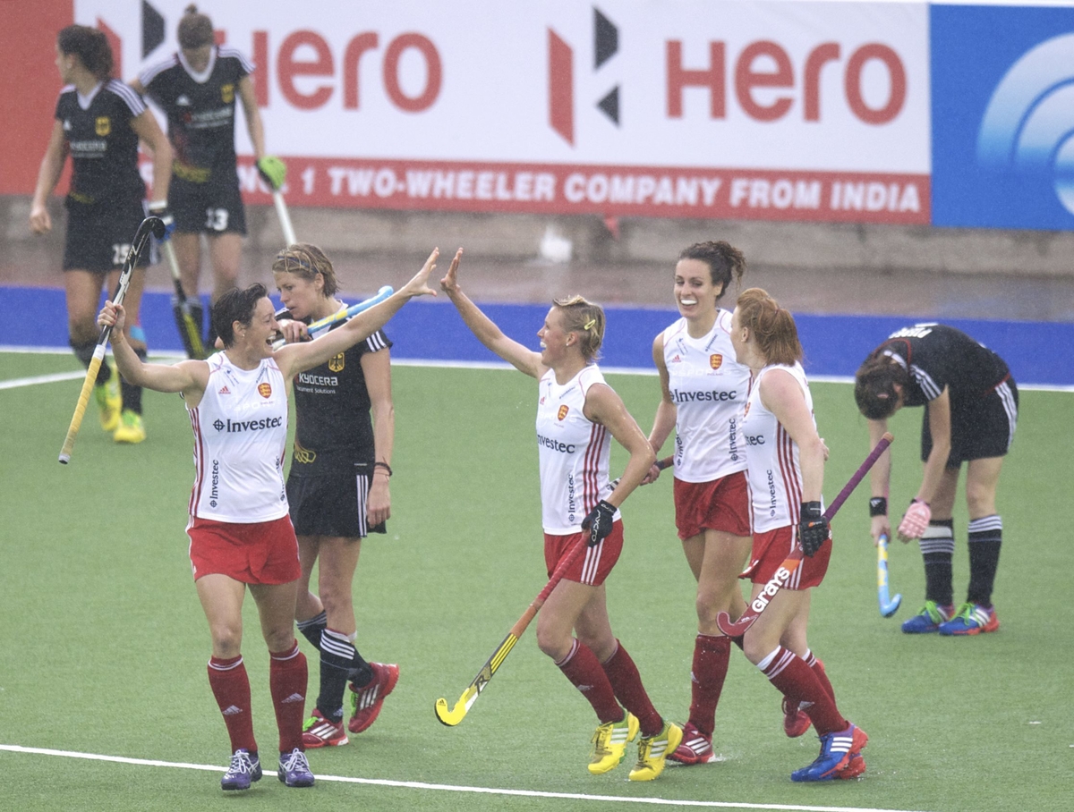 Alex Danson celebrates with Hannah Macleod after scoring England's third goal against Germany in the Argetina World League Final.jpg