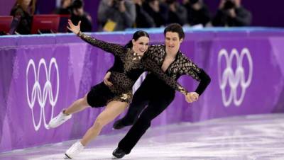 Women sport news - New World Record for Ice Skaters Virtue and Moir