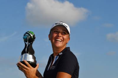 Women sport news - ROUSSIN STORMS TO SECOND LET TITLE WITH VICTORY IN SINGAPORE